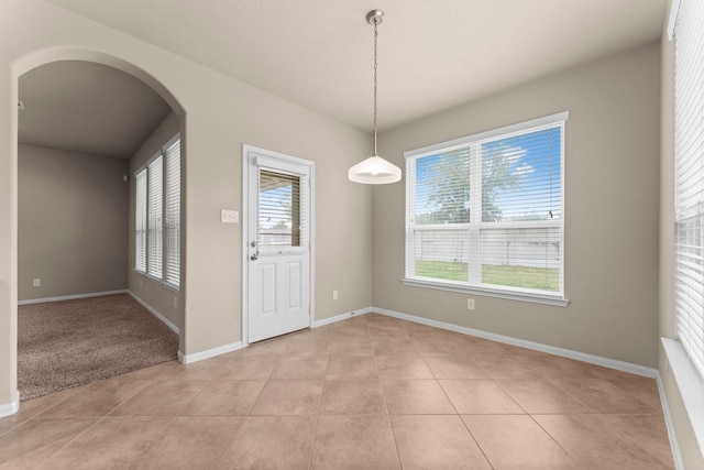 interior space with light tile patterned floors