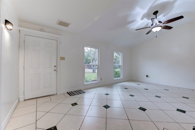 tiled entrance foyer with ceiling fan