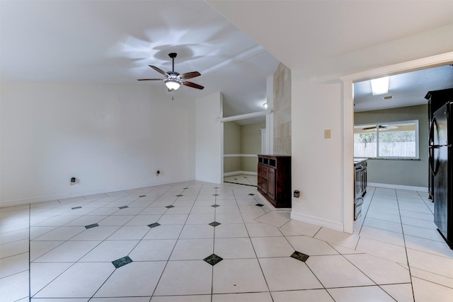 unfurnished living room featuring ceiling fan and light tile patterned flooring