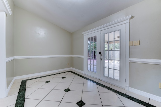 doorway featuring tile patterned flooring and french doors