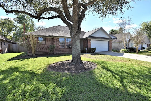 ranch-style home featuring a garage and a front yard