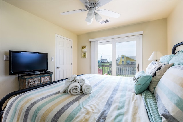 bedroom featuring ceiling fan and access to outside