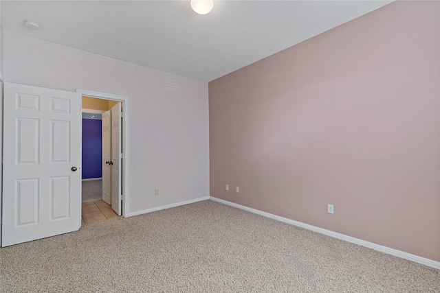 view of carpeted spare room