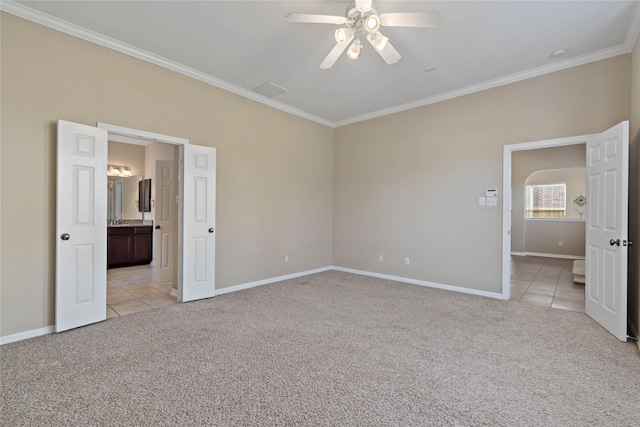 unfurnished bedroom with light carpet, ceiling fan, and ornamental molding