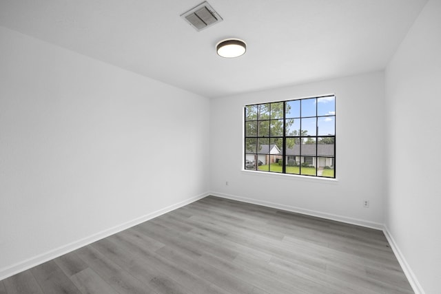 empty room with light wood-type flooring