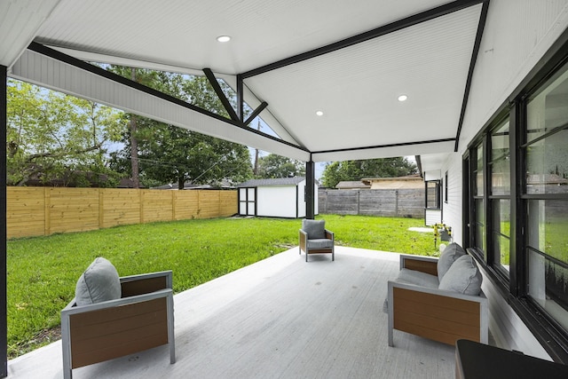 view of patio / terrace featuring a shed