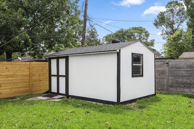 view of outdoor structure with a yard