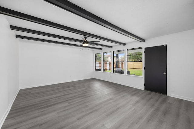 unfurnished living room featuring beamed ceiling, ceiling fan, and hardwood / wood-style flooring