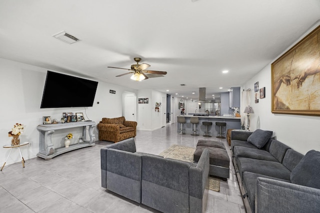 living room with ceiling fan