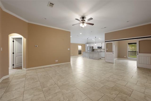 unfurnished living room with light tile patterned floors, ceiling fan, and crown molding