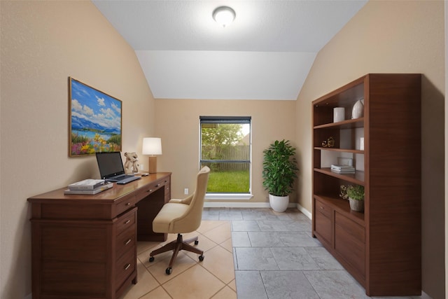 tiled home office with lofted ceiling