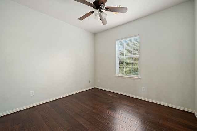 spare room with hardwood / wood-style flooring and ceiling fan