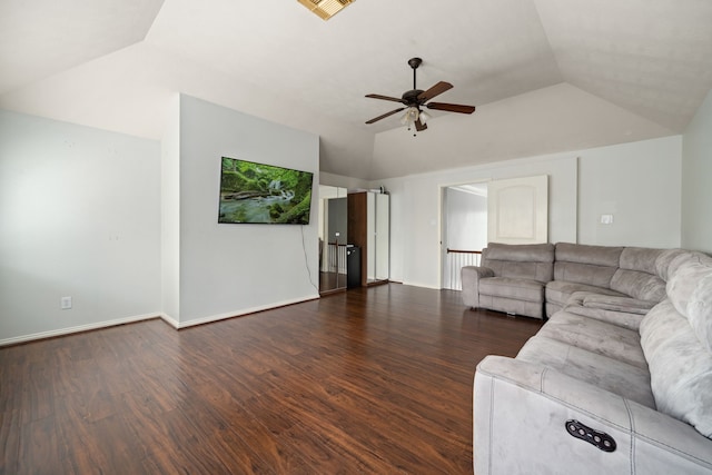 unfurnished living room featuring ceiling fan, dark wood-type flooring, and lofted ceiling