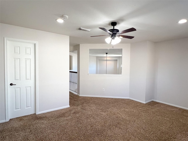 unfurnished room with carpet floors and ceiling fan