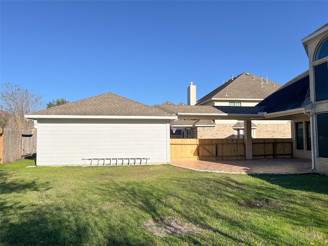 exterior space with a patio area and a yard