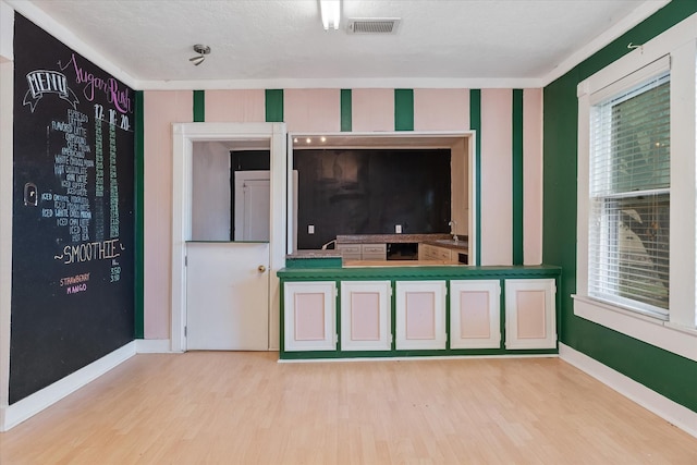 unfurnished living room with light hardwood / wood-style flooring