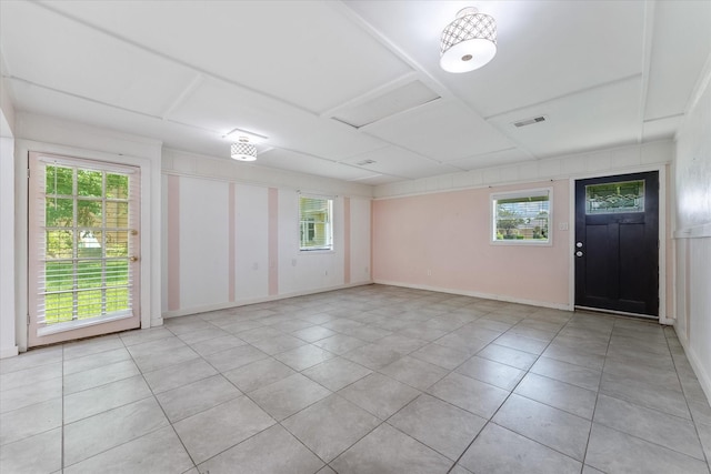 unfurnished room featuring light tile patterned floors