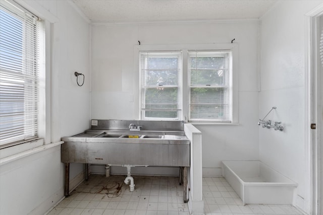 bathroom with a textured ceiling