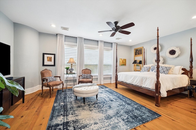 bedroom featuring ceiling fan and light hardwood / wood-style floors