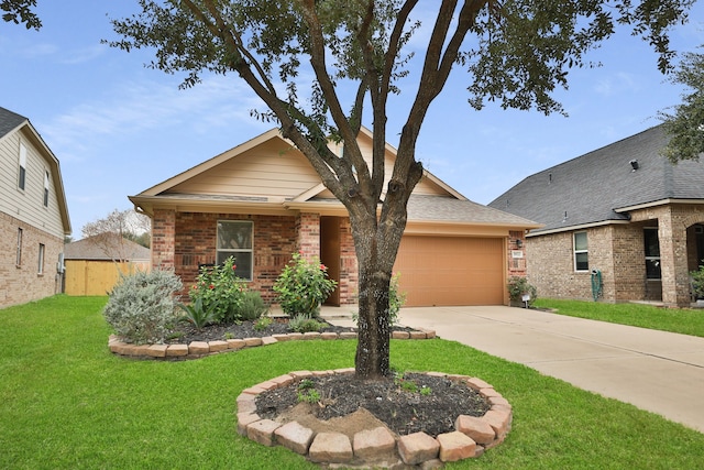 view of front of house with a garage and a front lawn