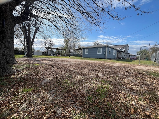 view of yard with a carport