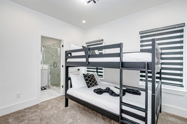 bedroom featuring ensuite bath