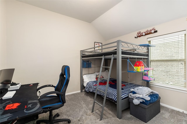 bedroom with carpet and lofted ceiling