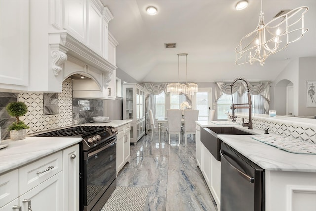 kitchen with dishwasher, black range with gas stovetop, and white cabinetry