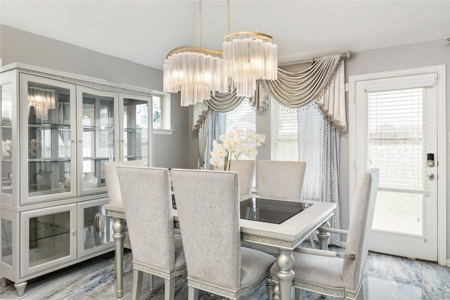 dining area with a chandelier