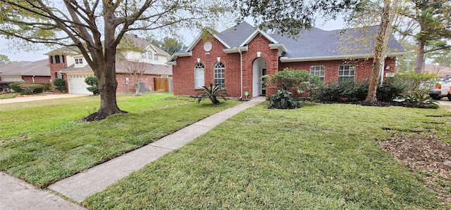 front facade with a garage and a front yard