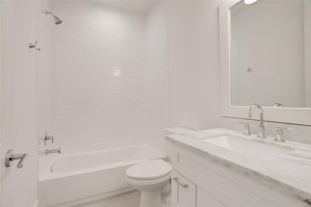 bathroom featuring toilet, tile patterned flooring, vanity, and bathing tub / shower combination