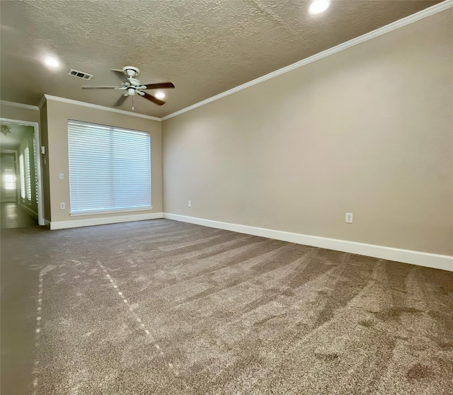 carpeted spare room featuring ceiling fan, crown molding, and a textured ceiling