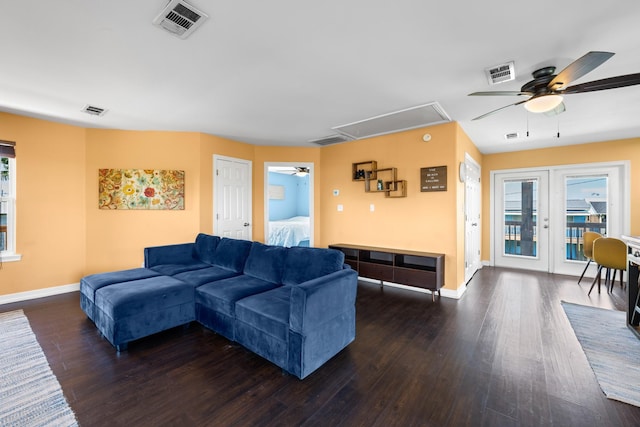 living room with ceiling fan, dark wood-type flooring, and french doors