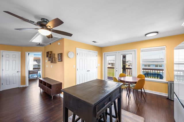 dining area with french doors, dark hardwood / wood-style flooring, and ceiling fan