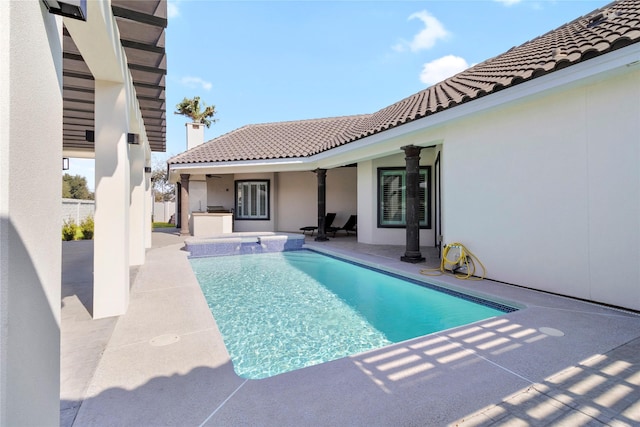 view of swimming pool featuring a patio area