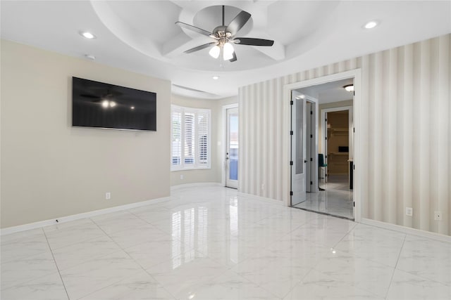 spare room featuring ceiling fan