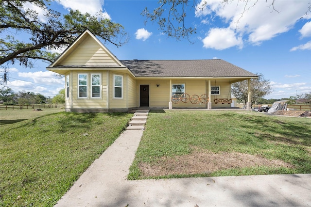 view of front of home featuring a porch and a front lawn