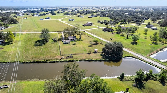 drone / aerial view with a rural view and a water view