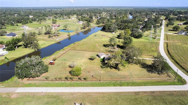 bird's eye view with a rural view and a water view