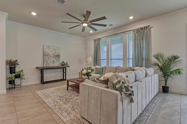 living room featuring ceiling fan, light tile patterned flooring, and ornamental molding