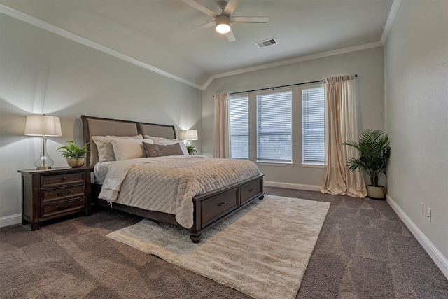 bedroom featuring dark colored carpet, vaulted ceiling, ceiling fan, and ornamental molding