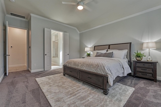 bedroom with carpet floors, ensuite bath, ceiling fan, and crown molding