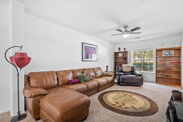 living room with carpet and ceiling fan