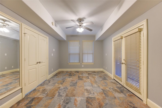 unfurnished bedroom with ceiling fan