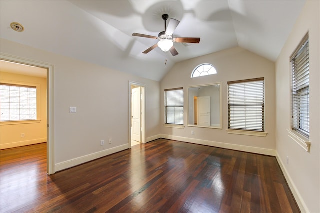 unfurnished room with ceiling fan, dark hardwood / wood-style floors, and vaulted ceiling