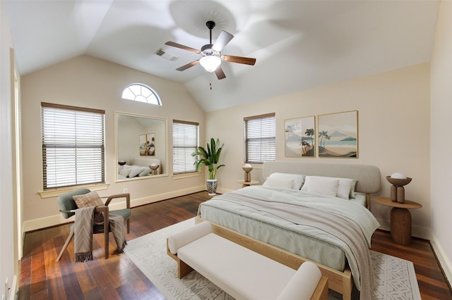 bedroom with ceiling fan, dark hardwood / wood-style flooring, and vaulted ceiling