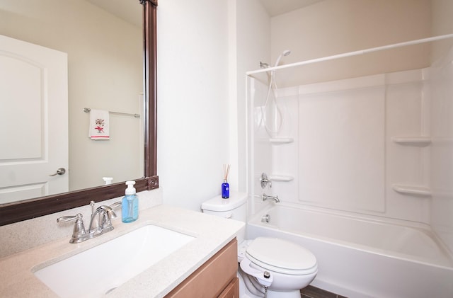 full bathroom with vanity, toilet, and washtub / shower combination