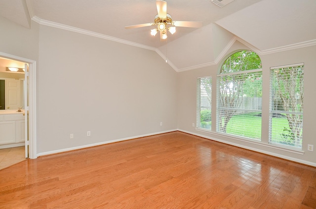 unfurnished room featuring light wood-type flooring, crown molding, ceiling fan, and lofted ceiling