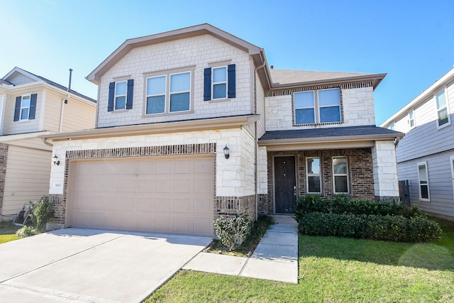 view of front of home with a garage and a front lawn