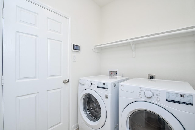 laundry room featuring laundry area and separate washer and dryer